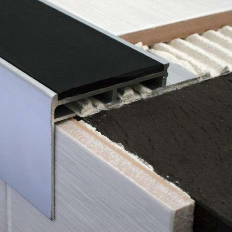 56x55mm heavy duty tile-in stair nosing installed in ceramic tile staircase